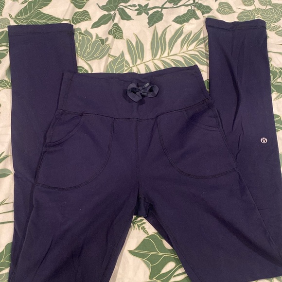 Bundle of lululemon women’s clothes: sports bras, running shorts, and leggings. - Picture 2 of 8